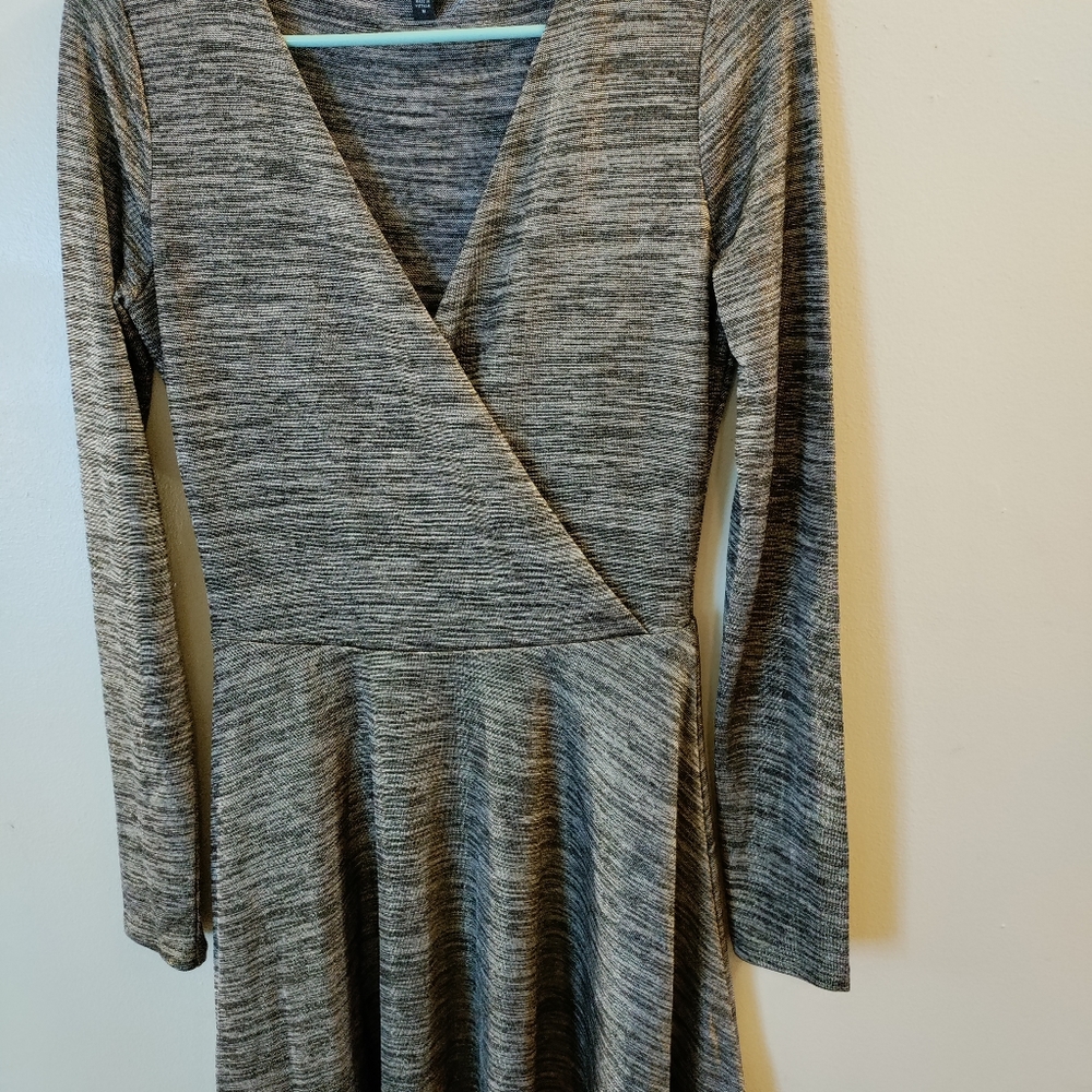 Women's gold and black wrap style dress